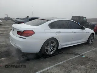 2014 BMW 6 Series 650i z VIN WBA6B2C59ED128936, wystawiony jako Copart lot #46409685 z przebiegiem 53 208 mil mil oraz Szkoda całkowita • Salvage title. Historia ofert i sprzedaży dostępna na DreamBid. Obrazek 3.
