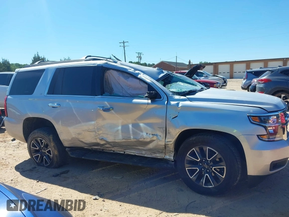 2020 Chevrolet Tahoe LT with VIN 1GNSKBKC5LR121085, listed as a IAAI auction lot 42341677 with 123,579 mi miles and . Bid and sale history available at DreamBid. Image 13.