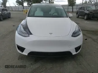 2023 Tesla Model Y Long Range z VIN 7SAYGDEE3PF916132, wystawiony jako Copart lot #51645625 z przebiegiem 28 238 mil mil oraz Szkoda całkowita • Salvage title. Historia ofert i sprzedaży dostępna na DreamBid. Obrazek 10.