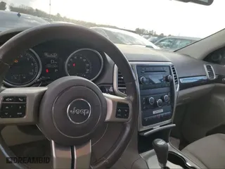 2011 Jeep Grand Cherokee Laredo with VIN 1J4RR4GG1BC669834, listed as a Copart auction lot 52923845 with 173,943 mi miles and Clean Title. Bid and sale history available at carsss.com. Image 9.