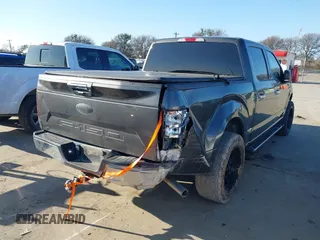 2019 Ford F-150 XL with VIN 1FTEW1CB3KKC43753, listed as a IAAI auction lot 41036512 with 108,257 mi miles and . Bid and sale history available at carsss.com. Image 4.