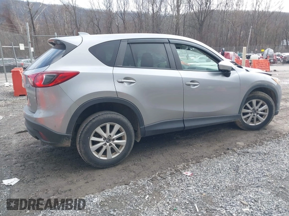 2013 Mazda CX-5 Touring with VIN JM3KE2CE9D0133348, listed as a IAAI auction lot 41357592 with 122,227 mi miles. Bid and sale history available at carsss.com. Image 4.