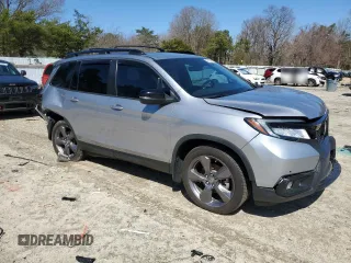 2021 Honda Passport Touring with VIN 5FNYF8H95MB014129, listed as a Copart auction lot 50105445 with 108,872 mi miles and Salvage Title. Bid and sale history available at carsss.com. Image 4.