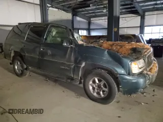 1999 GMC Denali z VIN 1GKEK13R5XR918465, wystawiony jako Copart lot #83269184 z przebiegiem Nie podano mil oraz Nie do naprawy. Historia ofert i sprzedaży dostępna na DreamBid. Obrazek 4.