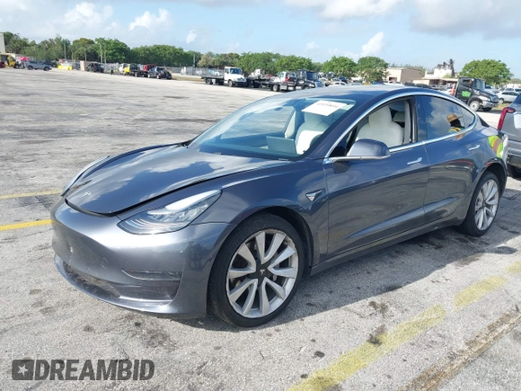 2020 Tesla Model 3 Standard Range Plus with VIN 5YJ3E1EA0LF744046, listed as a IAAI auction lot 41939894 with 102,576 mi miles. Bid and sale history available at carsss.com. Image 17.