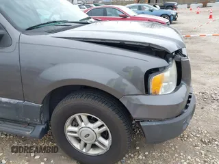2004 Ford Expedition Special Service with VIN 1FMPU16L44LA06653, listed as a IAAI auction lot 41827182 with 125,996 mi miles. Bid and sale history available at carsss.com. Image 13.