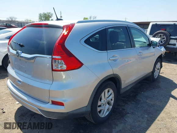 2015 Honda CR-V EX-L with VIN 2HKRM3H70FH552818, listed as a IAAI auction lot 41983061 with 202,898 mi miles and . Bid and sale history available at carsss.com. Image 4.