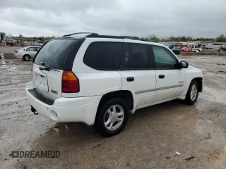 2006 GMC Envoy SLE z VIN 1GKDT13S562124794, wystawiony jako Copart lot #51649085 z przebiegiem 152 844 mil mil oraz Szkoda całkowita • Salvage title. Historia ofert i sprzedaży dostępna na DreamBid. Obrazek 3.