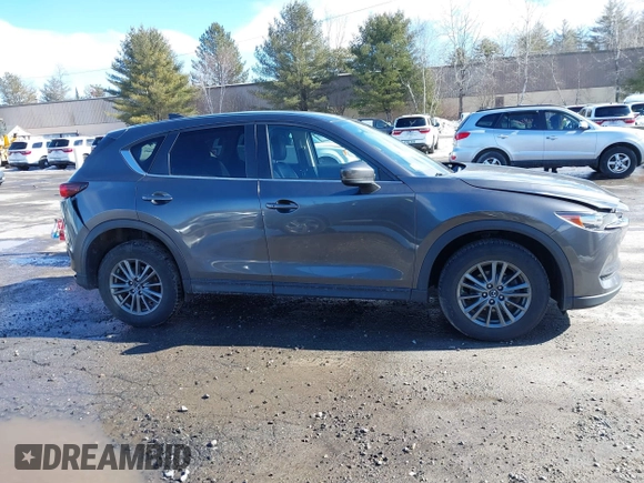 2017 Mazda CX-5 Touring with VIN JM3KFBCL3H0214881, listed as a IAAI auction lot 41694560 with 64,609 mi miles. Bid and sale history available at carsss.com. Image 13.
