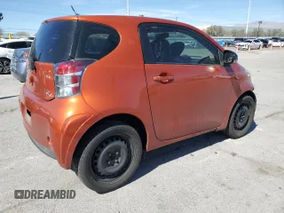 2013 Scion iQ z VIN JTNJJXB01DJ022124, wystawiony jako Copart lot #47960265 z przebiegiem 95 551 mil mil oraz Szkoda całkowita • Salvage title. Historia ofert i sprzedaży dostępna na DreamBid. Obrazek 3.