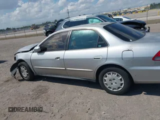 2002 Honda Accord LX z VIN JHMCG56462C005400, wystawiony jako IAAI lot #41893400 z przebiegiem Nie podano mil oraz . Historia ofert i sprzedaży dostępna na DreamBid. Obrazek 15.