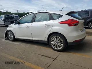 2017 Ford Focus Titanium with VIN 1FADP3N24HL206365, listed as a Copart auction lot 63199965 with 51,435 mi miles and Salvage title. Bid and sale history available at DreamBid. Image 2.