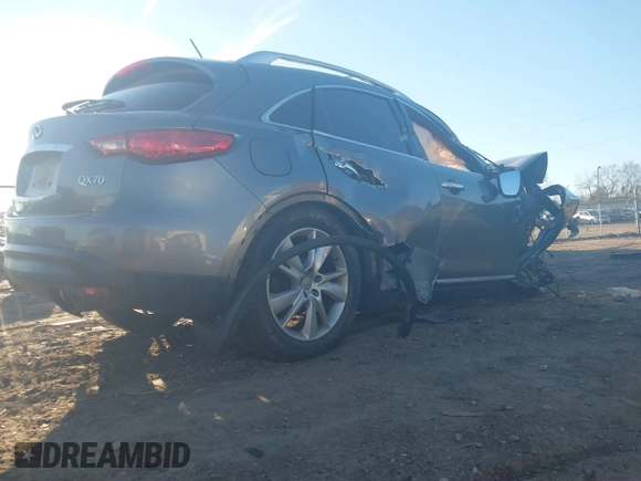 2015 Infiniti QX70 with VIN JN8CS1MWXFM480470, listed as a IAAI auction lot 41321666 with Not Provided miles and . Bid and sale history available at DreamBid. Image 4.