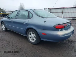 1999 Ford Taurus SE with VIN 1FAFP53U5XG190788, listed as a IAAI auction lot 41880104 with 68,810 mi miles and . Bid and sale history available at DreamBid. Image 3.