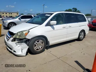 2005 Honda Odyssey EX-L z VIN 5FNRL38695B410815, wystawiony jako Copart lot #59009915 z przebiegiem 197 757 mil mil oraz Szkoda całkowita • Salvage title. Historia ofert i sprzedaży dostępna na DreamBid. Obrazek 1.