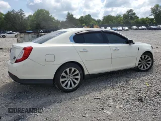 2013 Lincoln MKS with VIN 1LNHL9EK8DG605675, listed as a Copart auction lot 62448455 with 102,642 mi miles and Salvage title. Bid and sale history available at DreamBid. Image 3.