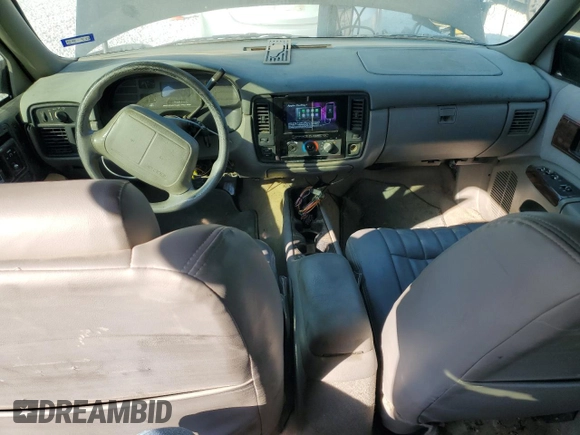 1996 Chevrolet Caprice with VIN 1G1BL82P2TR106404, listed as a Copart auction lot 74213214 with 156,588 mi miles and Salvage title. Bid and sale history available at DreamBid. Image 8.