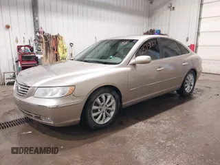 2006 Hyundai Azera SE with VIN KMHFC46F56A095383, listed as a IAAI auction lot 42373827 with 189,091 mi miles and . Bid and sale history available at DreamBid. Image 2.