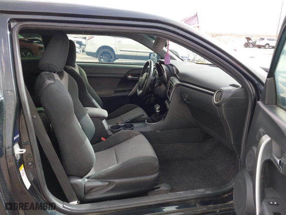 2016 Scion tC with VIN JTKJF5C76GJ017584, listed as a IAAI auction lot 41938981 with 121,166 mi miles. Bid and sale history available at carsss.com. Image 5.