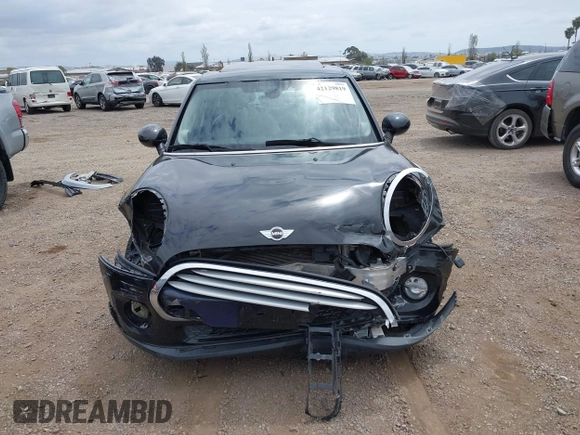 2015 MINI Hardtop 4 Door z VIN WMWXS5C58FT831568, wystawiony jako IAAI lot #42129819 z przebiegiem 76 044 mil mil oraz . Historia ofert i sprzedaży dostępna na DreamBid. Obrazek 13.