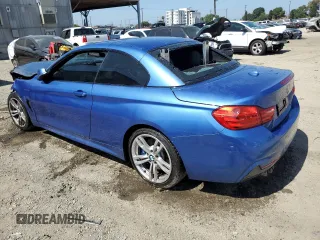 2014 BMW 4 Series 428i with VIN WBA3V7C54EP771068, listed as a Copart auction lot 61485295 with 142,300 mi miles and Salvage title. Bid and sale history available at DreamBid. Image 2.