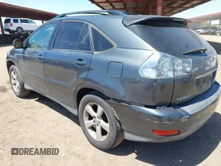 2004 Lexus RX 330 with VIN JTJGA31U340001595, listed as a IAAI auction lot 42125099 with 238,834 mi miles. Bid and sale history available at carsss.com. Image 6.