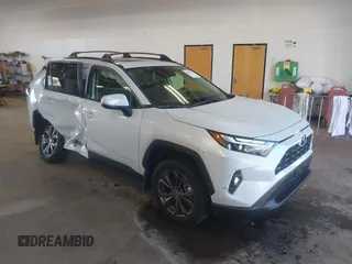 2024 Toyota RAV4 Hybrid XLE Premium with VIN JTMB6RFV6RJ054697, listed as a IAAI auction lot 42664291 with 15,207 mi miles and . Bid and sale history available at DreamBid. Image 1.