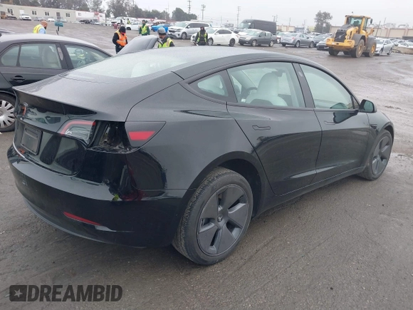 2023 Tesla Model 3 with VIN 5YJ3E1EA0PF587656, listed as a IAAI auction lot 41489586 with 12,844 mi miles and . Bid and sale history available at DreamBid. Image 4.