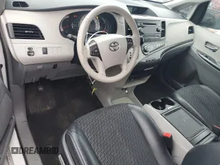 2014 Toyota Sienna SE with VIN 5TDXK3DCXES498422, listed as a Copart auction lot 51060775 with 131,541 mi miles and Clean Title. Bid and sale history available at DreamBid. Image 8.