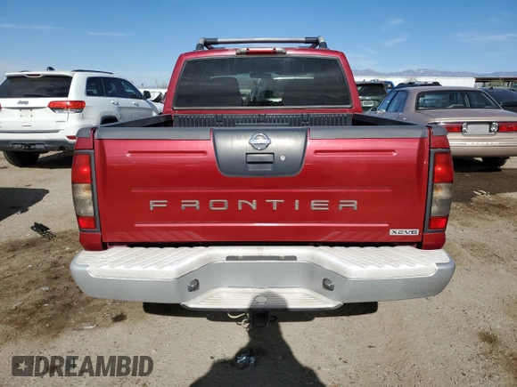 2003 Nissan Frontier XE with VIN 1N6ED27T13C409632, listed as a Copart auction lot 84884434 with 194,167 mi miles and Salvage title. Bid and sale history available at DreamBid. Image 6.