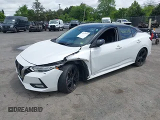 2020 Nissan Sentra SR z VIN 3N1AB8DV6LY228861, wystawiony jako IAAI lot #42225193 z przebiegiem 91 399 mil mil oraz . Historia ofert i sprzedaży dostępna na DreamBid. Obrazek 2.