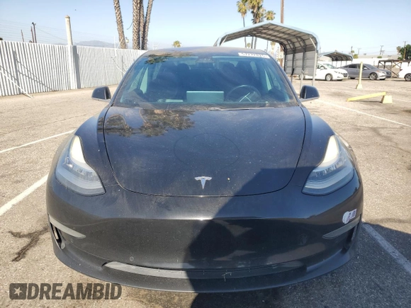 2018 Tesla Model 3 Long Range Battery z VIN 5YJ3E1EA8JF123005, wystawiony jako Copart lot #57272825 z przebiegiem 170 951 mil mil oraz Szkoda całkowita • Salvage title. Historia ofert i sprzedaży dostępna na DreamBid. Obrazek 5.