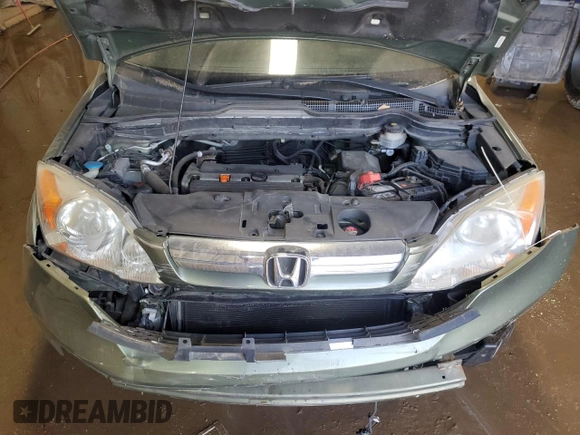 2007 Honda CR-V EX-L z VIN JHLRE38727C011511, wystawiony jako Copart lot #49104235 z przebiegiem 138 778 mil mil oraz Szkoda całkowita • Salvage title. Historia ofert i sprzedaży dostępna na DreamBid. Obrazek 11.