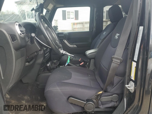 2015 Jeep Wrangler Unlimited Sahara with VIN 1C4BJWEG3FL530114, listed as a Copart auction lot 49444135 with 156,669 mi miles and Salvage Title. Bid and sale history available at carsss.com. Image 7.