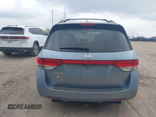 2014 Honda Odyssey Touring with VIN 5FNRL5H91EB081811, listed as a IAAI auction lot 42153920 with 16 mi miles and . Bid and sale history available at DreamBid. Image 16.