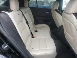2022 Cadillac XT4 AWD Sport с VIN 1GYFZFR46NF170841, выставлен на аукционе Copart как лот 55863705 с пробегом 14 745 миль миль и Списание • Salvage title. История ставок и продаж доступна на DreamBid. Изображение 11.