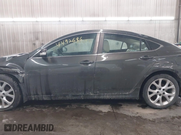 2012 Mazda 6 S Grand Touring with VIN 1YVHZ8CBXC5M00217, listed as a IAAI auction lot 41492686 with 101,571 mi miles and . Bid and sale history available at DreamBid. Image 14.