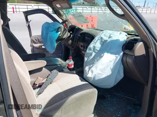 2003 Toyota Tundra SR5 with VIN 5TBRT34143S411690, listed as a IAAI auction lot 41854115 with 200,060 mi miles and . Bid and sale history available at DreamBid. Image 5.