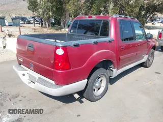 2002 Ford Explorer Sport Trac Value z VIN 1FMZU67EX2UC75933, wystawiony jako IAAI lot #42181837 z przebiegiem 223 979 mil mil oraz . Historia ofert i sprzedaży dostępna na DreamBid. Obrazek 4.