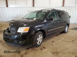 2010 Dodge Grand Caravan SXT z VIN 2D4RN5D13AR482773, wystawiony jako Copart lot #59865275 z przebiegiem 193 584 mil mil oraz Czysty tytuł • Clean title. Historia ofert i sprzedaży dostępna na DreamBid. Obrazek 1.
