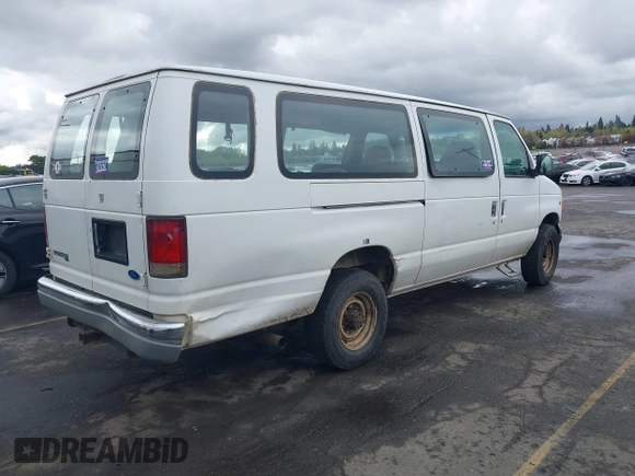 1997 Ford Econoline Wagon XL z VIN 1FBJS31L3VHB66356, wystawiony jako IAAI lot #39189974 z przebiegiem 242 944 mil mil oraz . Historia ofert i sprzedaży dostępna na DreamBid. Obrazek 4.