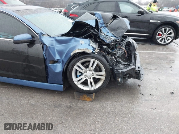 2009 Pontiac G8 z VIN 6G2ER57779L164764, wystawiony jako IAAI lot #41178467 z przebiegiem 205 282 mil mil oraz . Historia ofert i sprzedaży dostępna na DreamBid. Obrazek 18.