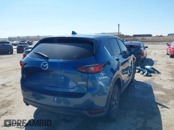 2018 Mazda CX-5 Touring with VIN JM3KFBCM0J0302916, listed as a IAAI auction lot 41837733 with 100,765 mi miles. Bid and sale history available at carsss.com. Image 4.