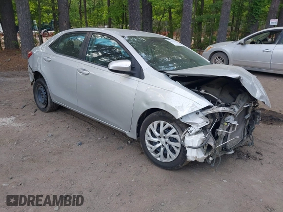 2018 Toyota Corolla L z VIN 5YFBURHE7JP812470, wystawiony jako IAAI lot #42183208 z przebiegiem 243 880 mil mil oraz . Historia ofert i sprzedaży dostępna na DreamBid. Obrazek 1.