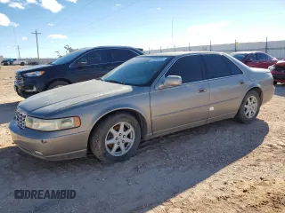 2004 Cadillac Seville Luxury SLS z VIN 1G6KS54Y14U172989, wystawiony jako Copart lot #80032884 z przebiegiem 55 832 mil mil oraz Szkody całkowita. Historia ofert i sprzedaży dostępna na DreamBid. Obrazek 1.