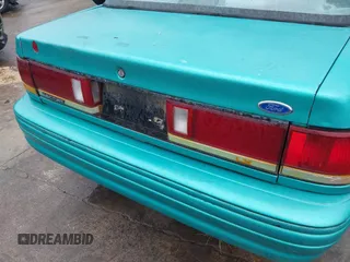 1994 Ford Escort z VIN 3FARP13J0RR121191, wystawiony jako IAAI lot #42202443 z przebiegiem 111 111 mil mil oraz . Historia ofert i sprzedaży dostępna na DreamBid. Obrazek 13.