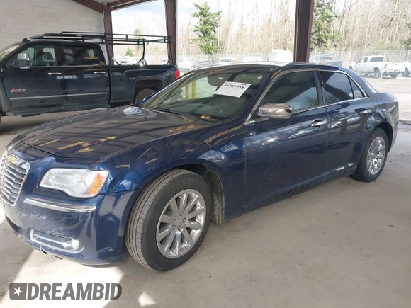 2013 Chrysler 300 with VIN 2C3CCAET7DH673242, listed as a IAAI auction lot 41785948 with 135,968 mi miles. Bid and sale history available at carsss.com. Image 2.