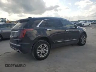 2021 Cadillac XT5 FWD Premium Luxury z VIN 1GYKNCR41MZ174477, wystawiony jako Copart lot #54335615 z przebiegiem 39 158 mil mil oraz Szkody całkowita. Historia ofert i sprzedaży dostępna na DreamBid. Obrazek 3.