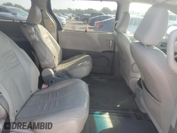 2012 Toyota Sienna XLE AAS z VIN 5TDYK3DC2CS196804, wystawiony jako Copart lot #65655755 z przebiegiem 298 629 mil mil oraz Czysty tytuł • Clean title. Historia ofert i sprzedaży dostępna na DreamBid. Obrazek 11.