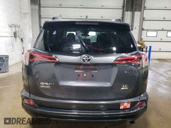 2018 Toyota RAV4 LE with VIN JTMBFREV1JD248395, listed as a Copart auction lot 51752305 with 62,161 mi miles and Salvage Title. Bid and sale history available at DreamBid. Image 6.